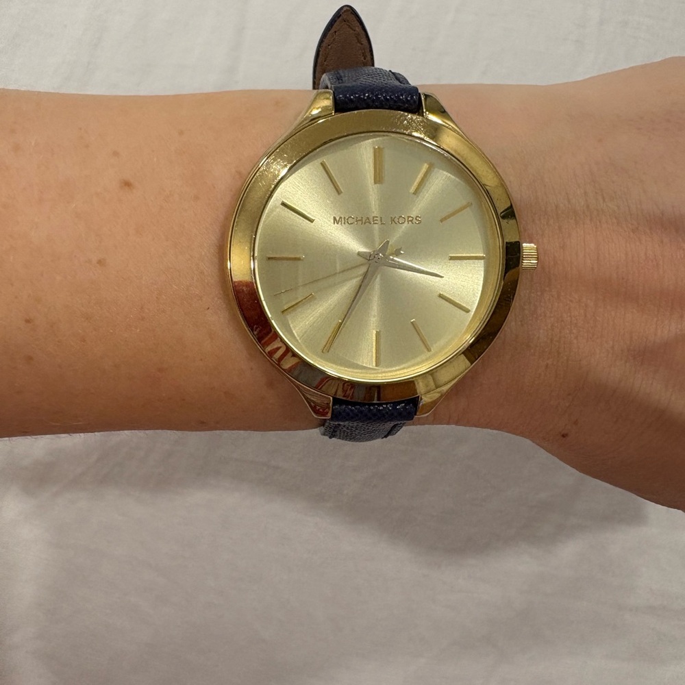 Michael Kors Gold and Blue Watch Sleek Design